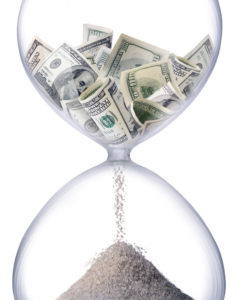 Hourglass with money as sand.